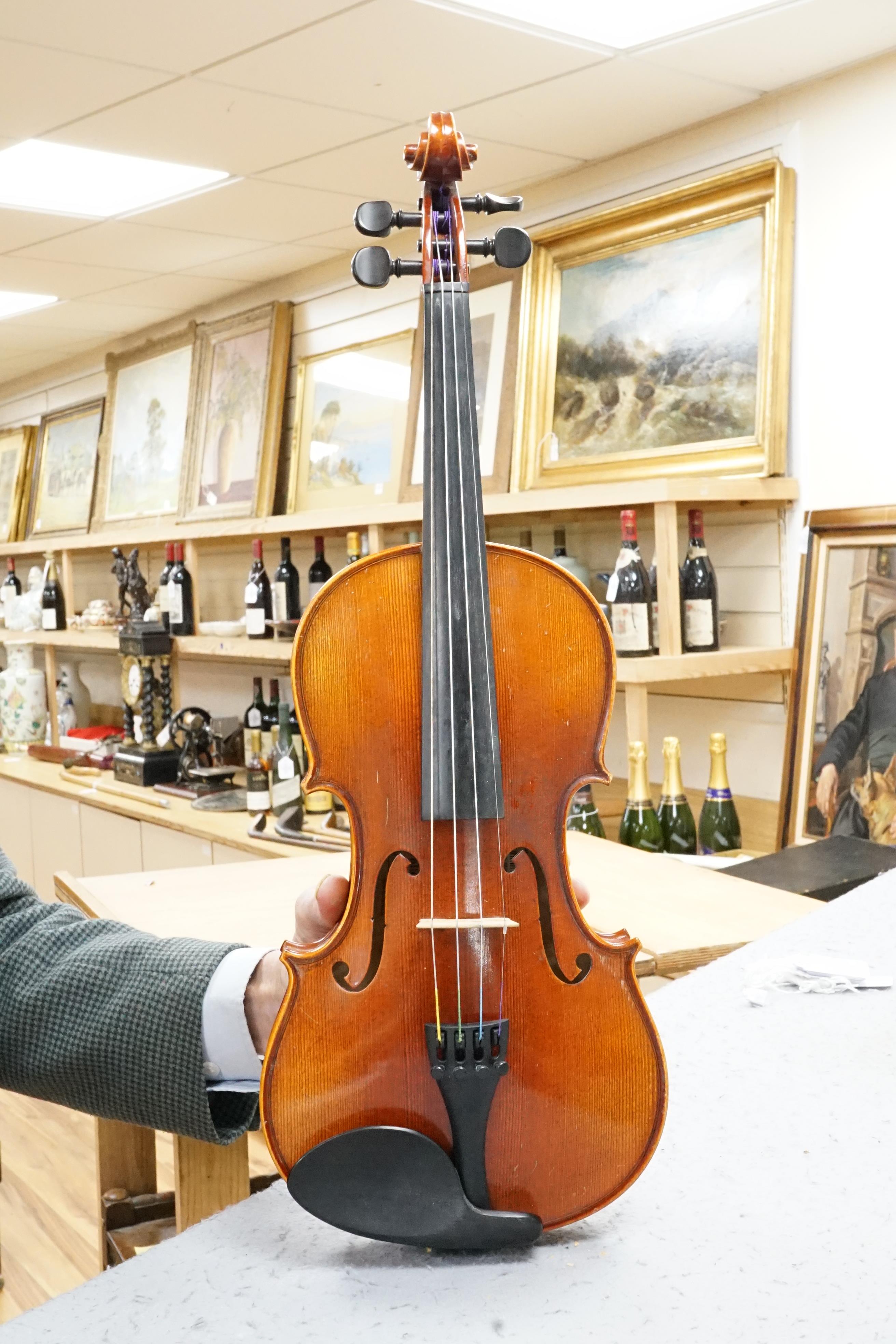 A violin, in fitted case (German)